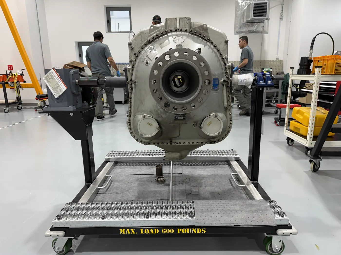 Front view of an engine on a teardown cart