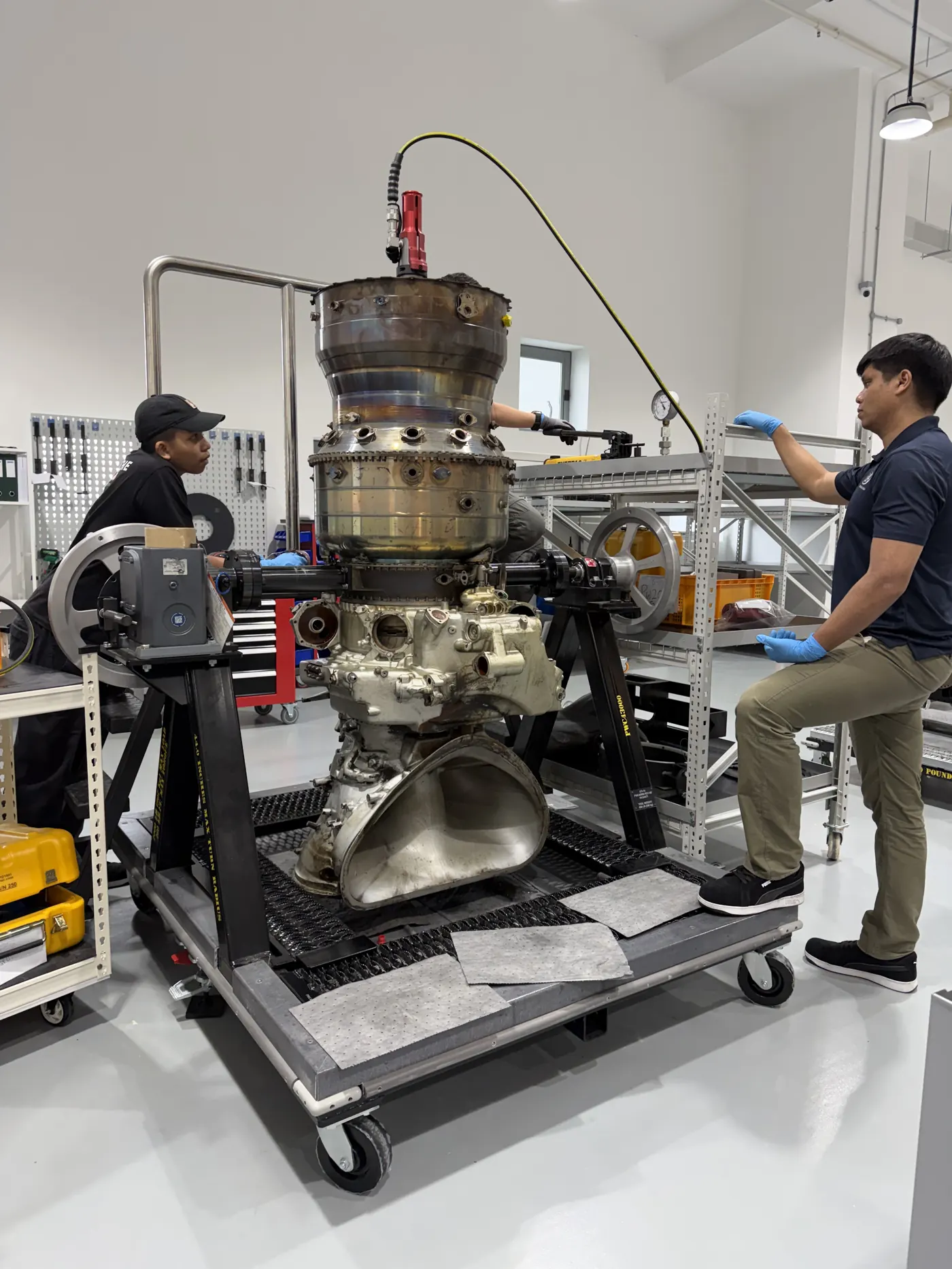 Engine module mounted upright on a stand at BIAero Singapore